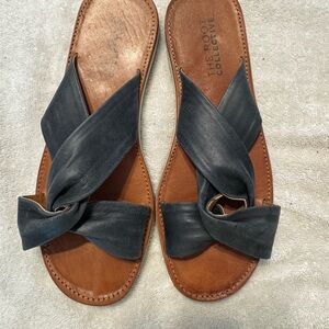 The Root Collective Black Sandals with Twisted Strap Design